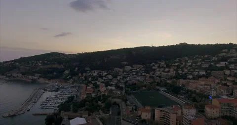 Flight over the coast of Nice at sunset. Mairie de Villefranche-sur-Mer Video stock 160010869