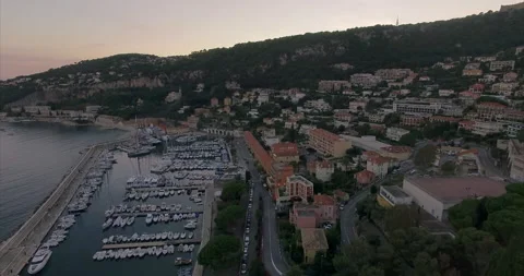 Flight over the coast of Nice at sunset. Mairie de Villefranche-sur-Mer Stock Footage 160010938