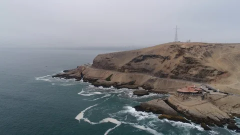 Flight over a coast to the skyline of Lima, Peru Stock Footage 113562934
