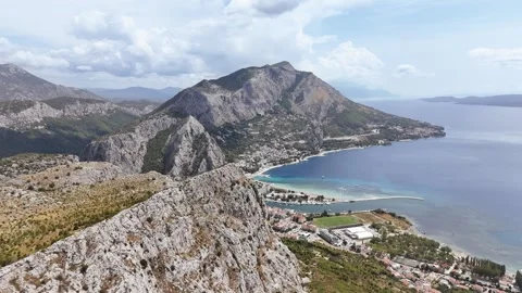 Flight over the coastal mountain range towards town Omis, Croatia Stock Footage 287258987