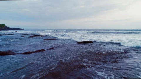 Flight over the coastal waves of the ocean 7 Stock Footage 121307896
