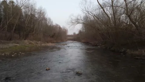 Flight over cold river in austria Video stock 152987783