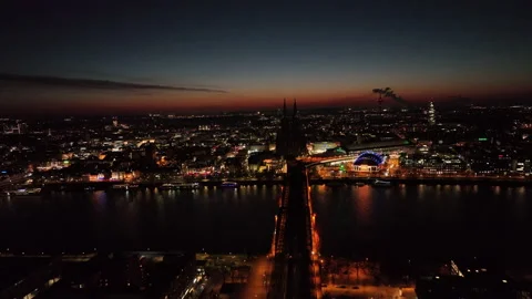 Flight over Cologne at night, showing the Cologne Cathedral and the Rhine Video stock 234614518