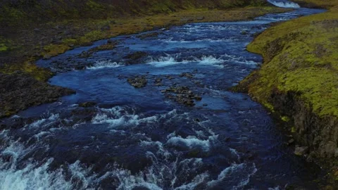 Flight over colossal fields, hills and waterfall in Iceland.Drone 4k video Stock Footage 167109549