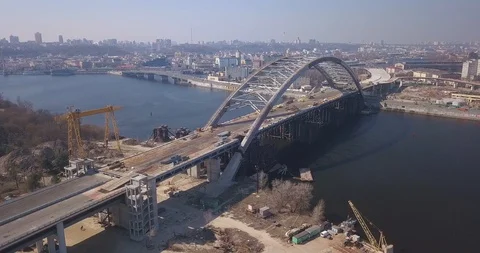 Flight over the construction of the bridge Kiev Ukraine March 25, 2020, Video stock 127215926