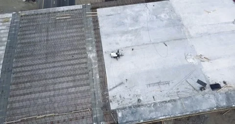 Flight over the construction of the interchange bridge on the highway on which Stock Footage 130649634