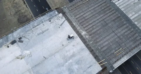 Flight over the construction of the interchange bridge on the highway on which Stock-Footage 130850427