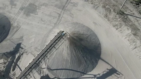 Flight over conveyor belt in work process. Over stone crusher plant machine Stock Footage 138297100