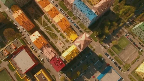 Flight over cozy comfortable colored houses in a European city 4K UHD aerial Stock Footage 75012713