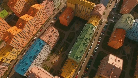 Flight over cozy comfortable colored houses in a European city 4K UHD aerial Stock Footage 75013376