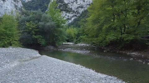 Flight over creek 動画素材 195182047