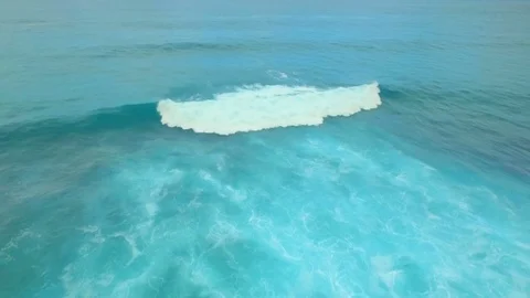 Flight over the crest of a wave Stock Footage 73349109