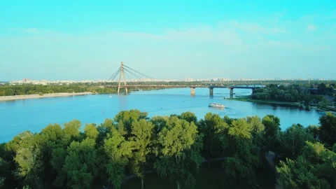 Flight over the crowns of trees in the Natalka Park at the banks of the Dnipro Stock Footage 200974437