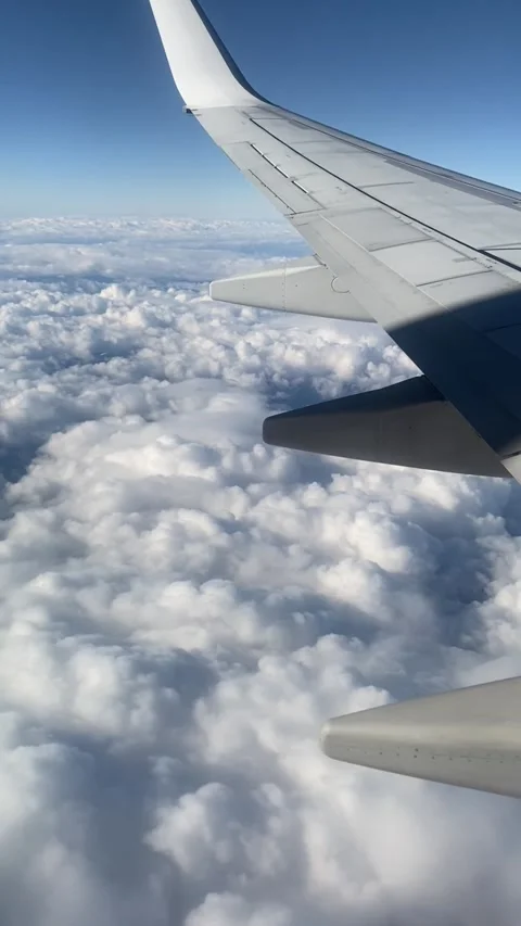 Flight over dense clouds above the Mediterranean sea from Malta Stock Footage 310702922