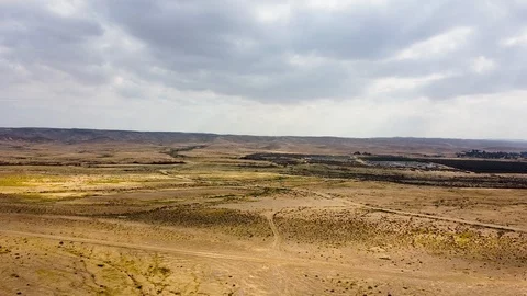 Flight over the desert before heavy rain in winter Stock-Footage 125620988