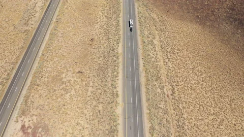 Flight over a desert highway 2 Stock Footage 142790974