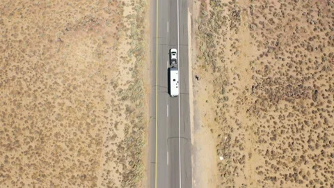 Flight over a desert highway Stock Footage 142786517