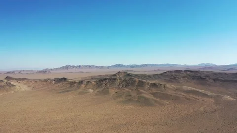 Flight over desert mountains and scenic desert landscape Stock Footage 144679200
