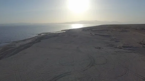 Flight over deserted beach Stock Footage 125922487