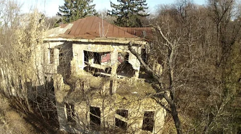 Flight over destroyed house and park in city. Aerial slow Stock Footage 32707744