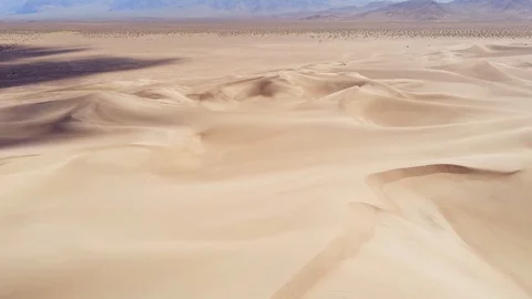 Flight over dry desert lands Stock-Footage 106937544
