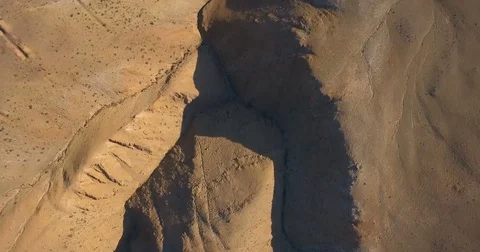 Flight over the dry riverbed in the red mountains Stock Footage 80863972