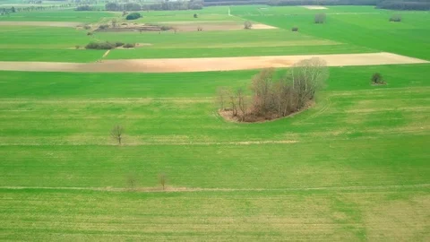 Flight over early spring field. 4k drone video. Stock Footage 127588103