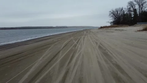 Flight over the evening autumn beach. Video stock 168180579