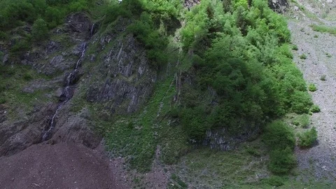 Flight over an extended waterfall Video stock 77057509