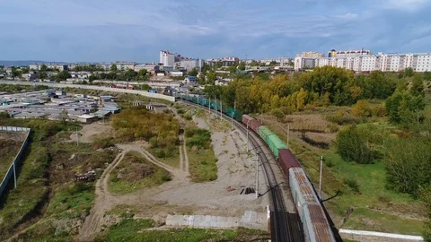 Flight over a fast freight train Stock Footage 87790113