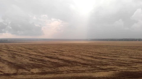 Flight over field n the rain Stock Footage 107237955