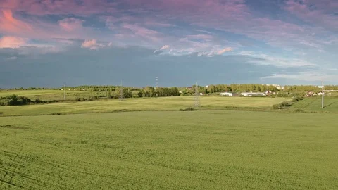 Flight over the field at sunset Stock Footage 109200300