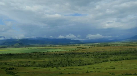 Flight over fields in fog. Altai. Siberia Stock Footage 34145719