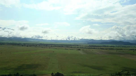 Flight over fields in fog. Altai. Siberia Stock Footage 34145773