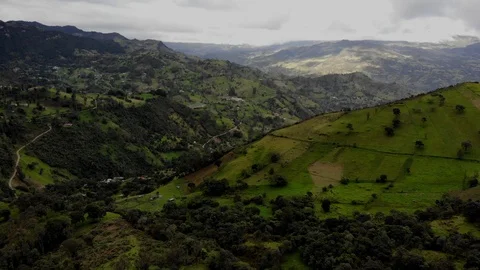 Flight over fields in mountains Stock Footage 124924139