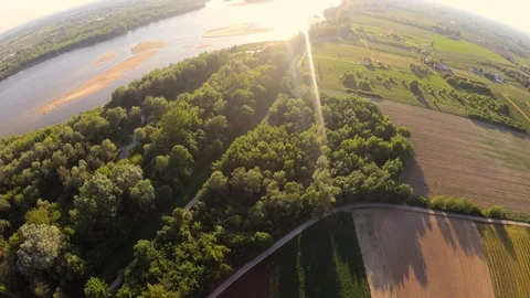 Flight over the fields towards the sun Stock Footage 89454437