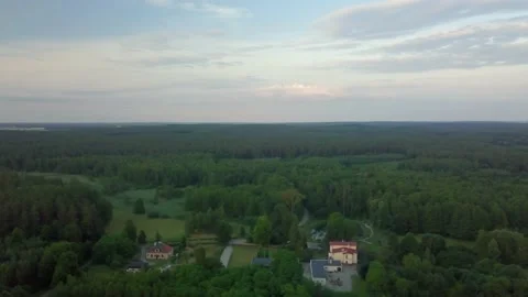 Flight over forest and house in forest. Drone shot. Video stock 156278038