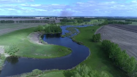 Flight over forest and river Stockbeeldmateriaal 76926120