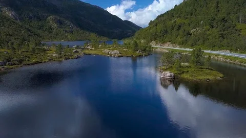 Flight over a forest lake and islands. Stock Footage 94477720