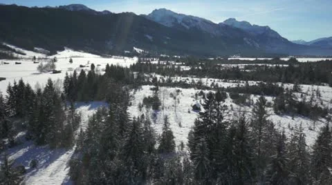 Flight over a forest in winter in Bavaria, Southern Germany Stock Footage 20525019