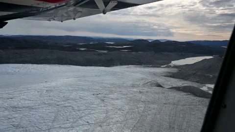 Flight over glacier in ice bay in airplane Video stock 131930875