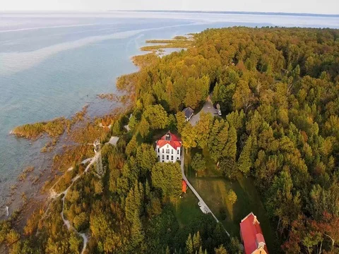 Flight over Grand Traverse Light lighthouse Stock Footage 80164298