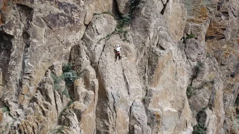 Flight over green fields and rocks. The Alpine camp. Shooting from the air. Stock Footage 88544944