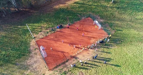 Flight over the ground where they play football. Aerial view. 4k footage Stock Footage 98970444