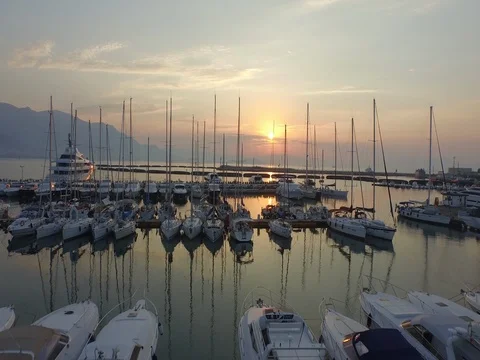 Flight over the harbor of the small town in Italy with moored boats Stock Footage 72331251