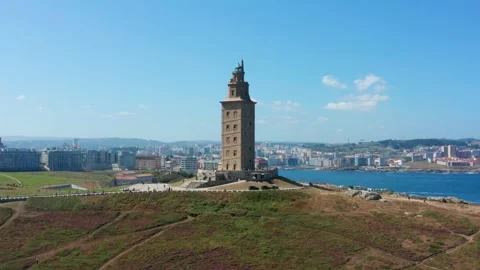 Flight over Hercules Tower in La Coruna Stock Footage 145189338