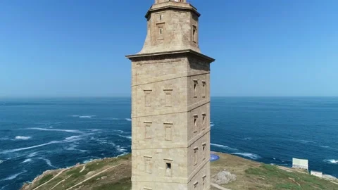 Flight over Hercules Tower in La Coruna Stock Footage 145189361