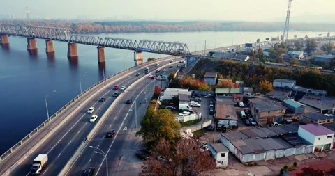 Flight over the highway, along the river and the industrial zone on the other Stock Footage 146365007