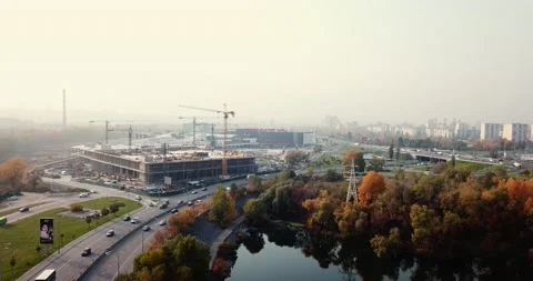 Flight over the highway, along the river and the industrial zone on the other Stock Footage 160894849