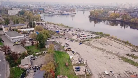 Flight over the highway, along the river and the industrial zone on the other Stock Footage 210089553